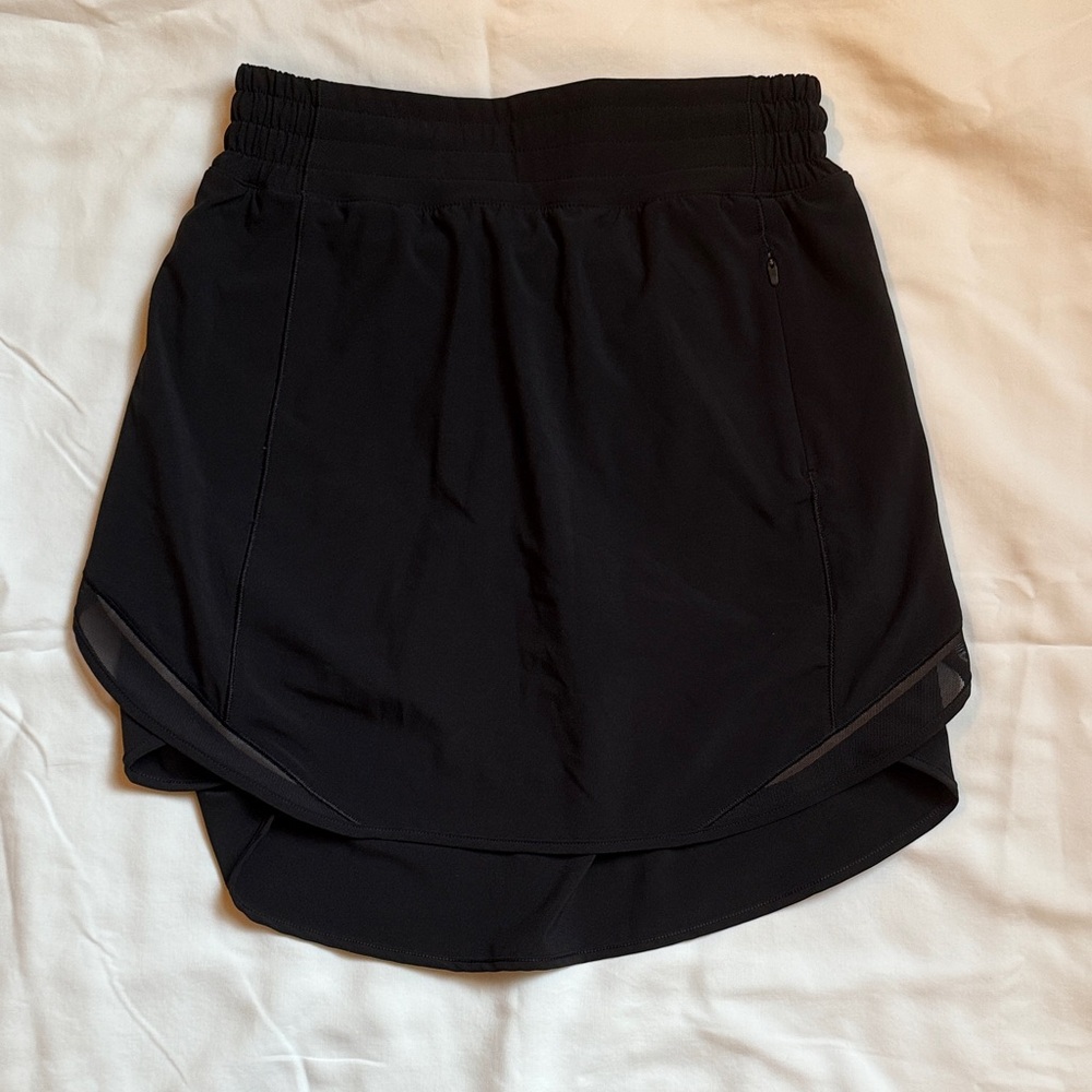 Lululemon Hotty Hot High Rise Tennis Skort. Color: black, size 4. 15”